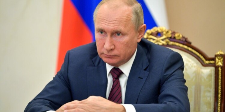Russian President Vladimir Putin attends a meeting via video conference in Moscow, Russia, Thursday, Nov. 5, 2020. (Alexei Druzhinin, Sputnik, Kremlin Pool Photo via AP)