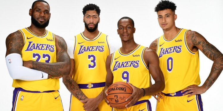 EL SEGUNDO, CA - SEPTEMBER 27: LeBron James #23, Anthony Davis #3, Rajon Rondo #9, and Kyle Kuzma #0 of the Los Angeles Lakers pose for a portrait during media day on September 27, 2019 at the UCLA Health Training Center in El Segundo, California. NOTE TO USER: User expressly acknowledges and agrees that, by downloading and/or using this photograph, user is consenting to the terms and conditions of the Getty Images License Agreement. Mandatory Copyright Notice: Copyright 2019 NBAE (Photo by Andrew D. Bernstein/NBAE via Getty Images)