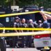 Baton Rouge Police Dept. officers gather at the scene on Conrad Drive in Baton Rouge, La., Sunday, April 26, 2020, where two Baton Rouge Police officers were shot, about a block off of Foster Drive.