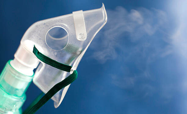 Oxygen inhalation mask for breathing medical treatment.