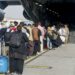 This handout photo courtesy of US Marines Corps shows evacuees stage before boarding a C-17 Globemaster III during an evacuation at Hamid Karzai International Airport, Kabul, Afghanistan, August 18, 2021. (Photo by Nicholas GUEVARA / US MARINE CORPS / AFP) / RESTRICTED TO EDITORIAL USE - MANDATORY CREDIT "AFP PHOTO / US MARINES CORP / Lance Cpl. Nicholas GUEVARA" - NO MARKETING - NO ADVERTISING CAMPAIGNS - DISTRIBUTED AS A SERVICE TO CLIENTS