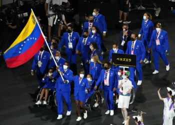 Athletes from Venezuela enter the stadium during the opening ceremony for the 2020 Paralympics at the National Stadium in Tokyo, Tuesday, Aug. 24, 2021. (AP Photo/Eugene Hoshiko)