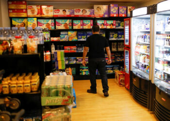 A man looks at diapers in a convenience store at a five-star hotel in Caracas, Venezuela October 12, 2018. Picture taken October 12, 2018. REUTERS/Marco Bello