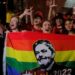 Supporters of Brazilian former President (2003-2010) and candidate for the leftist Workers Party (PT) Luiz Inacio Lula da Silva celebrate while watching the vote count of the presidential run-off election at the Paulista avenue in Sao Paulo, Brazil, on October 30, 2022. (Photo by CAIO GUATELLI / AFP) (Photo by CAIO GUATELLI/AFP via Getty Images)