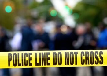 Police tape secures a crime scene outside a club after a shooting in Brooklyn on October 12, 2019. - At least four people died and three were wounded in a shooting at a social club in New York eary Saturday, police said. No one has been arrested over the shooting, which took place in Brooklyn, and the motive and exact circumstances are not known, a New York police official told AFP. The local affiliate of ABC News described the place where the shooting took place as an after-hours club. (Photo by Johannes EISELE / AFP) (Photo by JOHANNES EISELE/AFP via Getty Images)