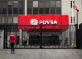 View of the entrance of the headquarters of Petróleos de Venezuela (PDVSA) in Caracas, taken on September 13, 2023. (Photo by Miguel Zambrano / AFP)